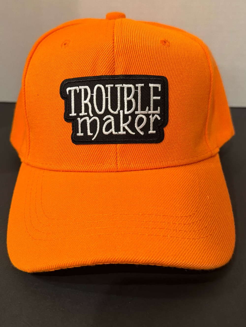 Troublemaker Orange or blue Baseball Cap
